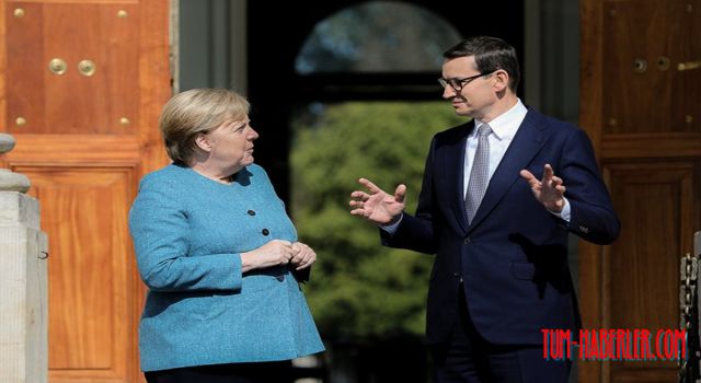 Merkel'den göçmen uyarısı